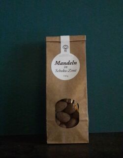 Mandel in feiner Schokolade mit Zimt (Tüte)